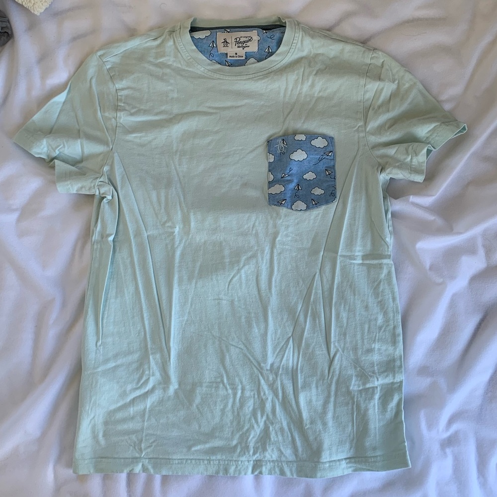 Penguin tee paper airplane front pocket